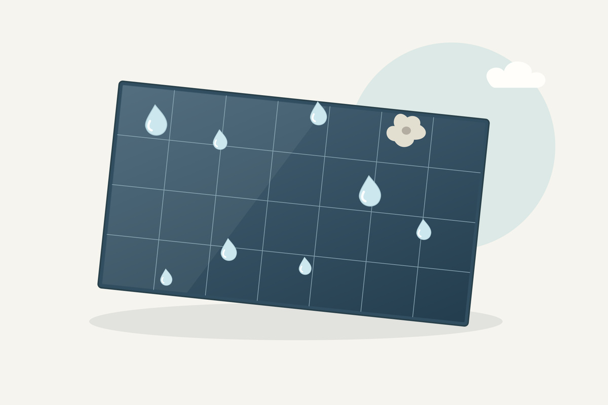 Schematisch zonnepaneel met waterdruppels en een plaatselijke vuilvlek op het glas.